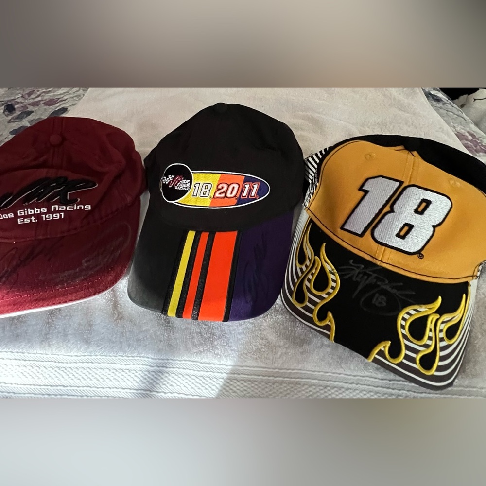 3  NASCAR vintage hats from JGR. Never worn in excellent condition. Autographed.